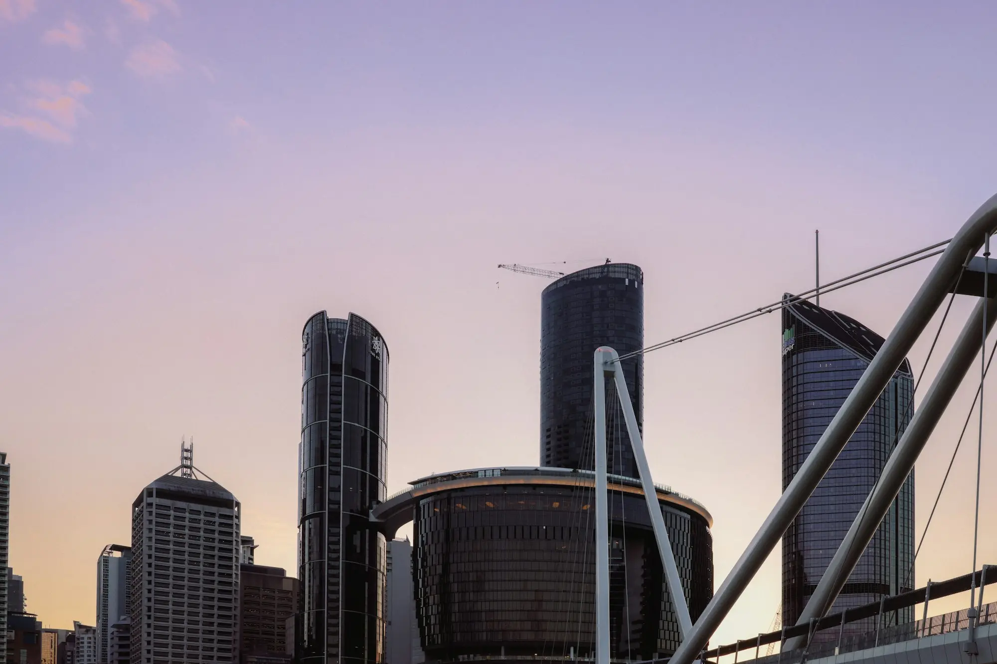 Brisbane city skyline with a bridge in the foreground