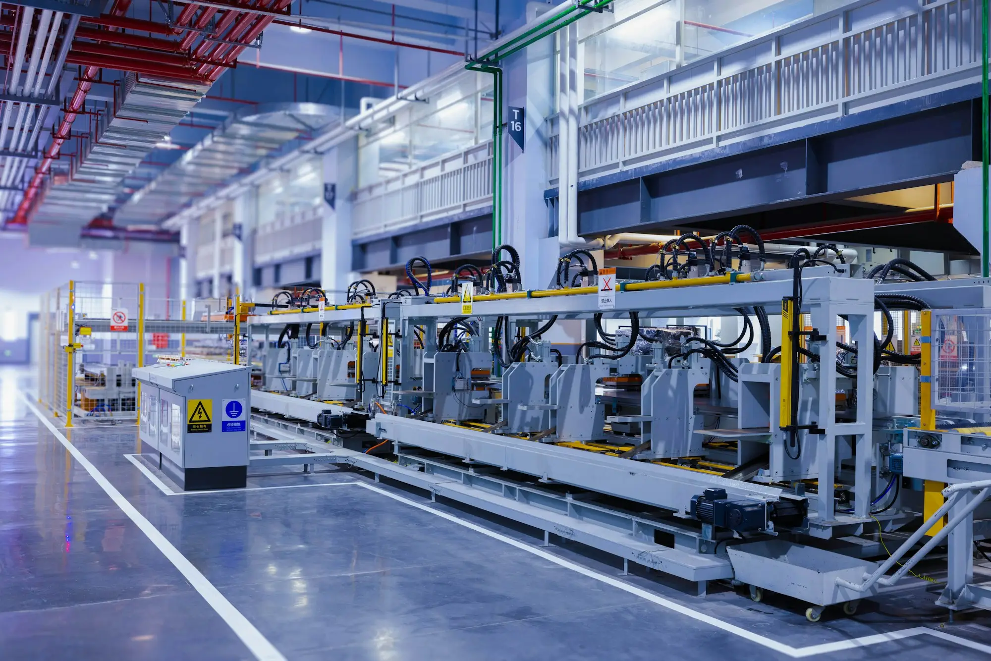 Large production machine inside a factory building