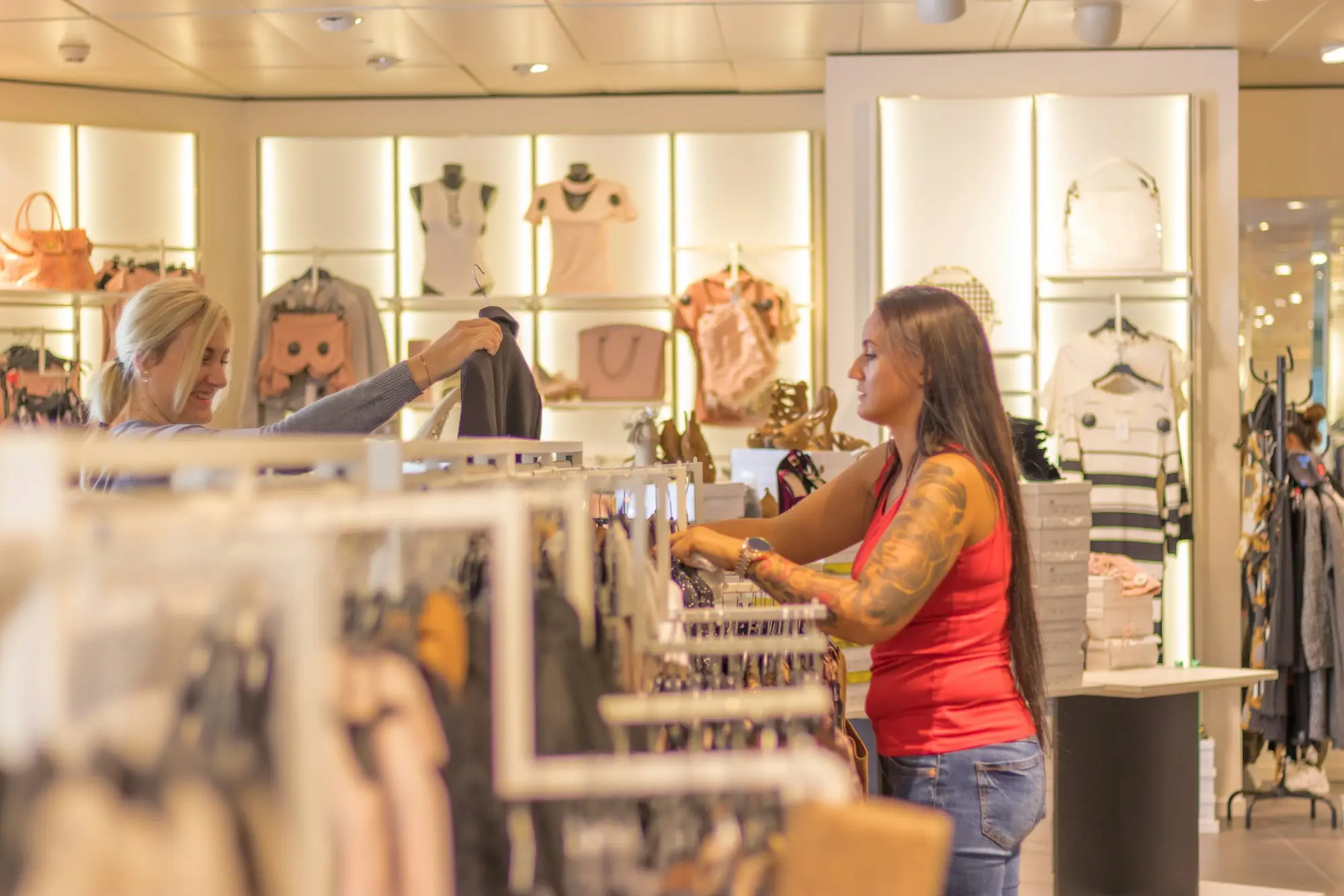 Shop owner standing in her store before opening
